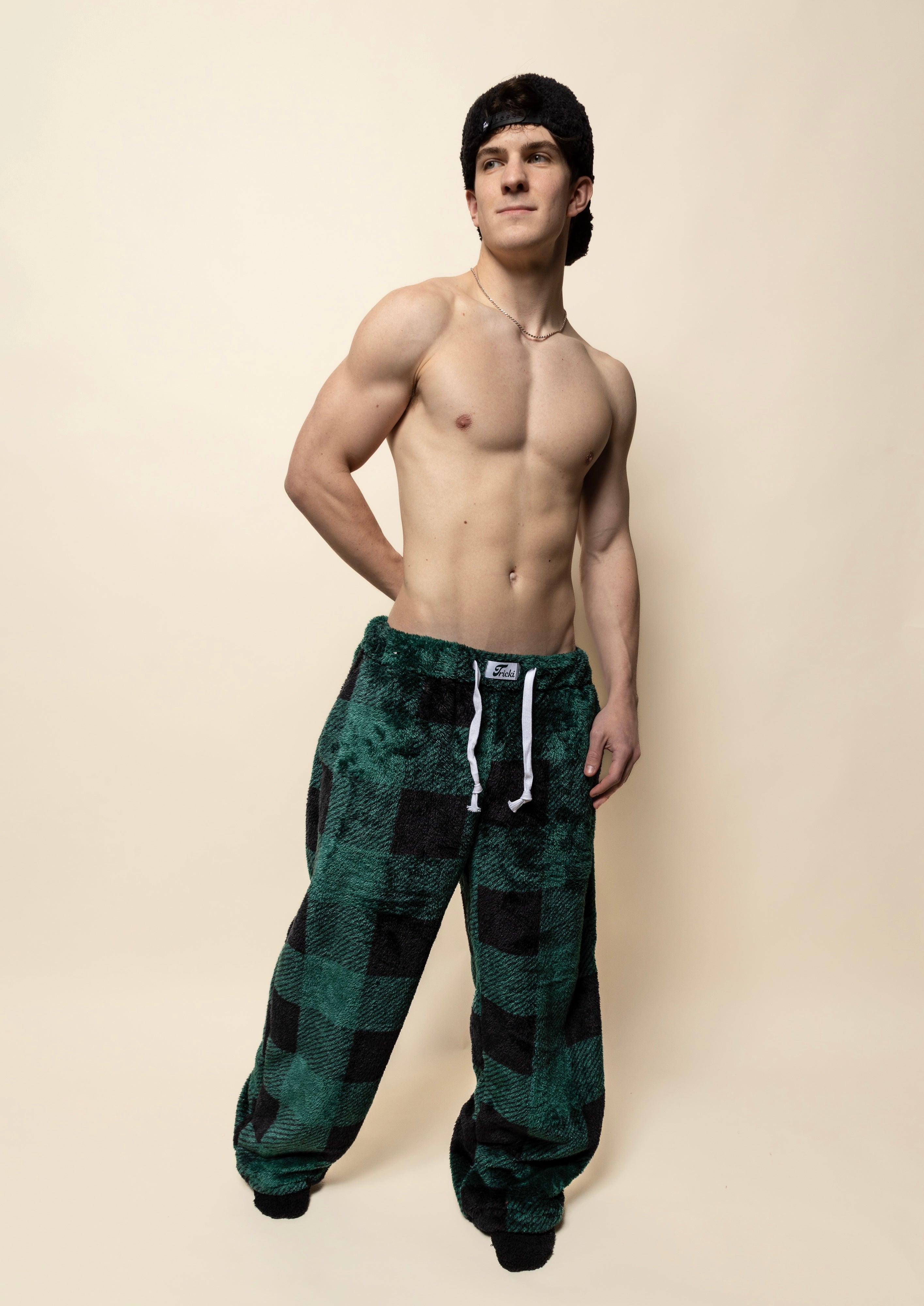 fuzzy oversized sherpa pj pants in dark green checkered pattern for men